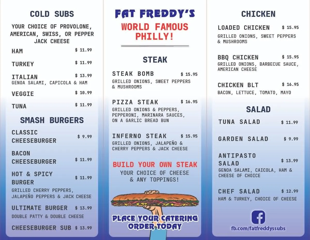 Fat Freddy's takeout menu inside — cold subs, smash burgers, world famous Philly steak, chicken, salads with prices